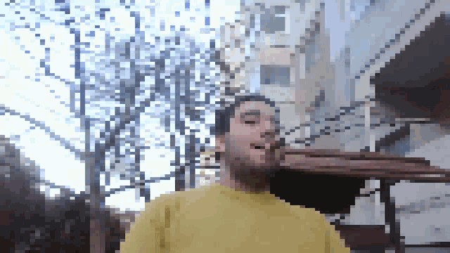 a pixelated image of a man smoking a cigar