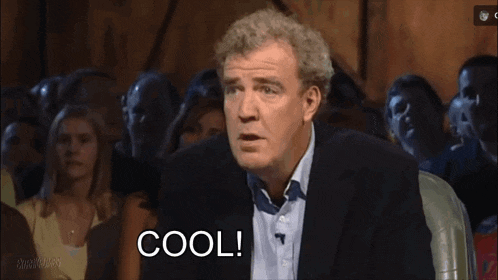 a man in front of a crowd says cool anyway