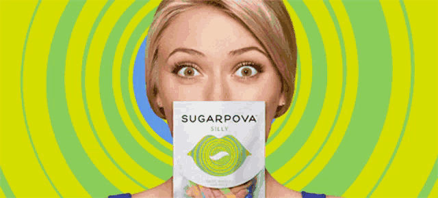 a woman holds a bag of sugarpova silly candy