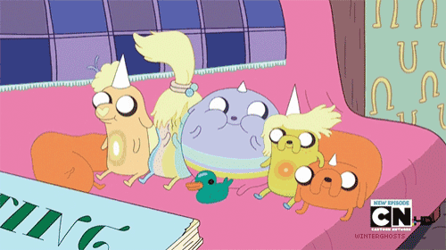 a group of cartoon characters are sitting on a bed with cn written on the bottom