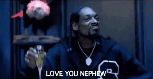 snoop dogg is wearing a fur coat and tie and says i love you nephew