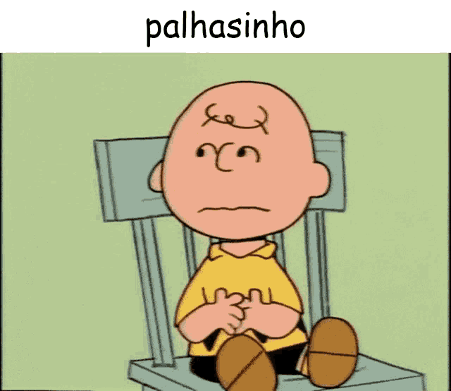 a cartoon of charlie brown is sitting in a chair with the word palhasinho above him
