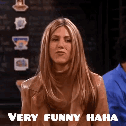 a woman says very funny haha in front of her