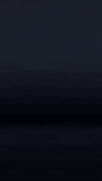 a dark background with a purple light coming out of the middle