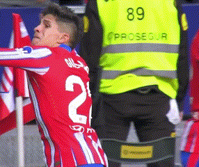 a man in a red jersey with the number 2 on the back