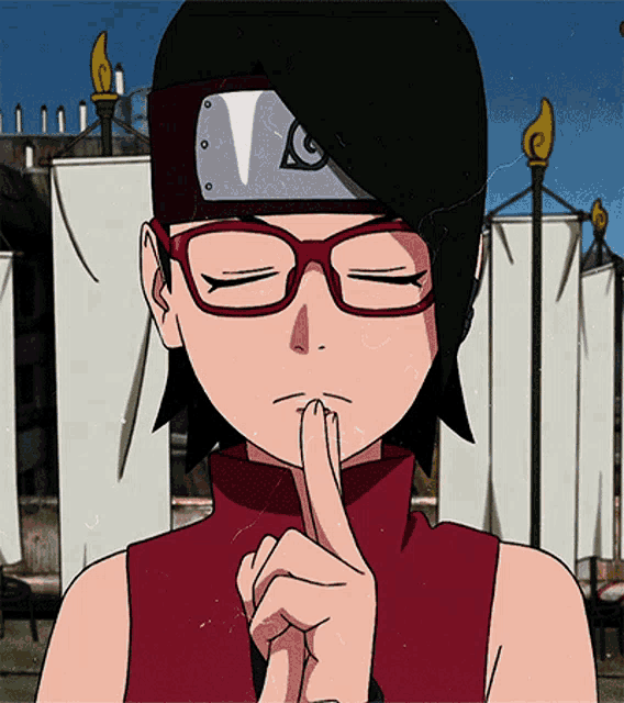 a girl with glasses and a headband is holding her finger to her mouth