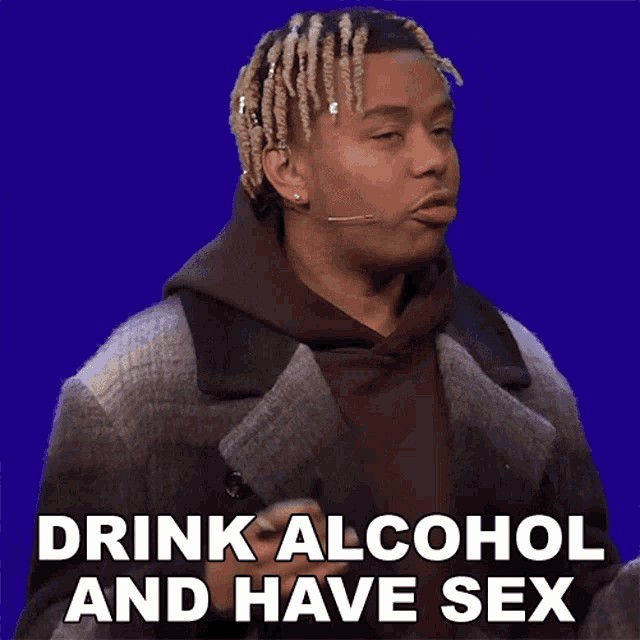 a man says drink alcohol and have sex while holding a microphone