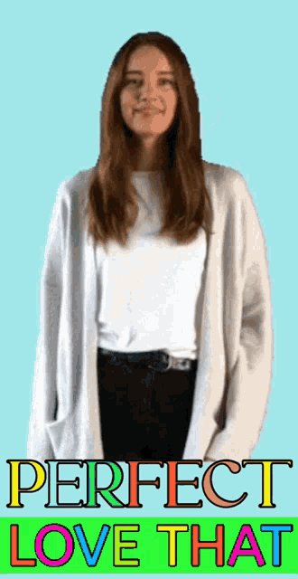 a woman wearing a white shirt and a white cardigan with perfect love that written on the bottom