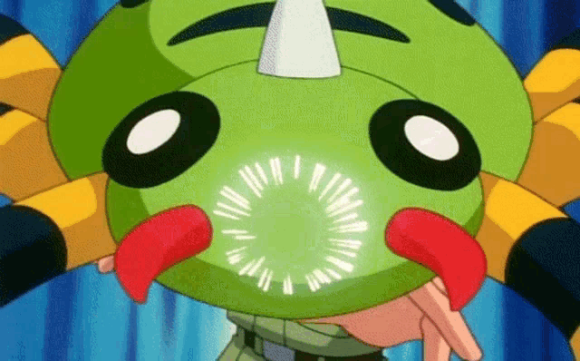a close up of a cartoon character with a green head