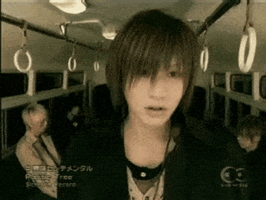 a man on a bus with the words plastic tree on the bottom right