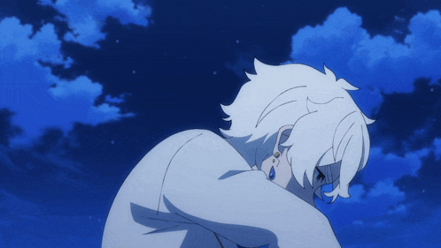 a person with white hair is looking down at something