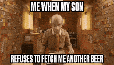 a man is sitting at a table with a sign that says me when my son refuses to fetch me