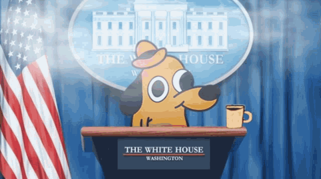 a dog sitting at a podium in front of a white house sign