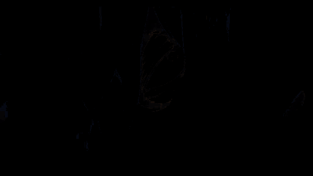 a close up of a person 's face in a dark room with a blue background