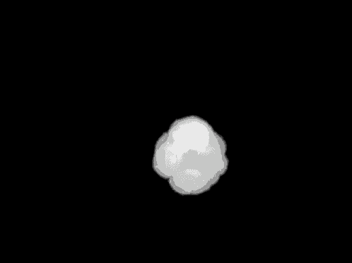 a white cloud is floating in the air on a black background