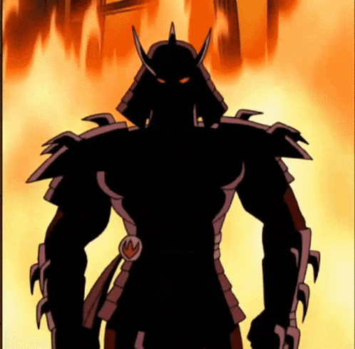 a samurai standing in front of a burning building
