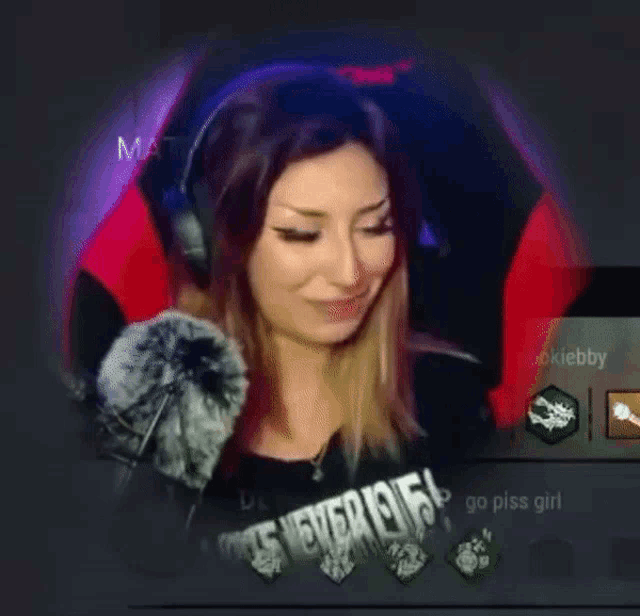 a woman wearing headphones and a t-shirt that says ' anyways ' on it