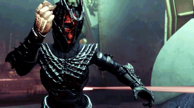 a video game character is wearing a helmet with a red face and a skull on it