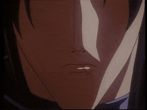 a close up of a person 's face with a triangle in the eye