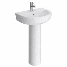 a white pedestal sink with a faucet on it