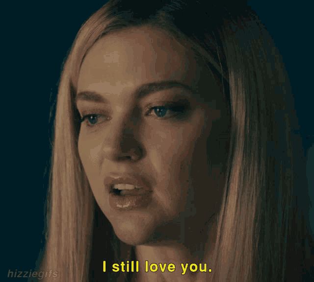 a woman says " i still love you " in a gif