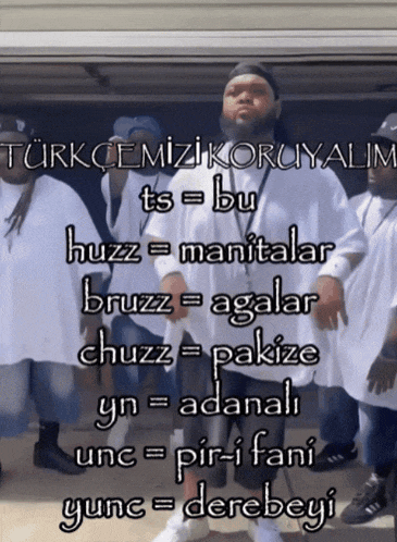a group of men standing in front of a sign that says ' turkcemizi koruyalim ' on it