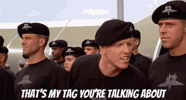 a group of soldiers standing next to each other with the caption that 's my tag you 're talking about on the bottom