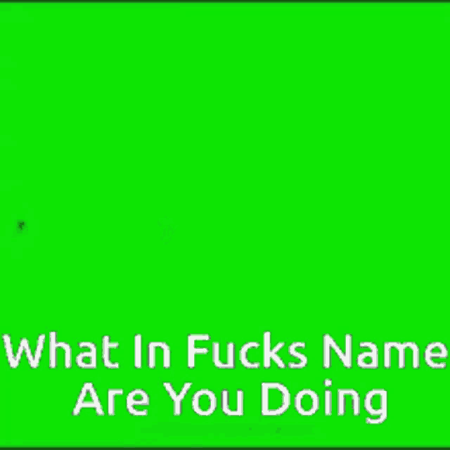 a man in a white tank top and blue jeans is standing on a green screen .
