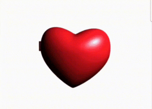 a heart shaped mirror with a picture of a girl inside