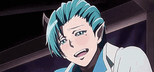 a man with blue hair and horns is making a funny face while wearing a white shirt .