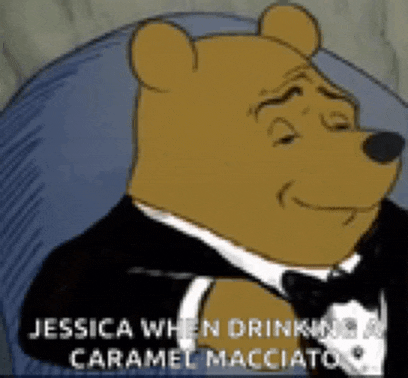 winnie the pooh is wearing a tuxedo and bow tie while drinking caramel macchiato