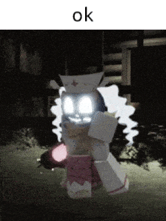 a cartoon character with a glowing face is standing in the dark with the word ok below it .