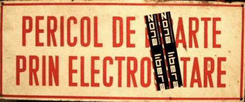 a sign that says " pericol de arte prin electrostare "