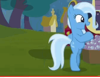 a blue pony is standing in a grassy field