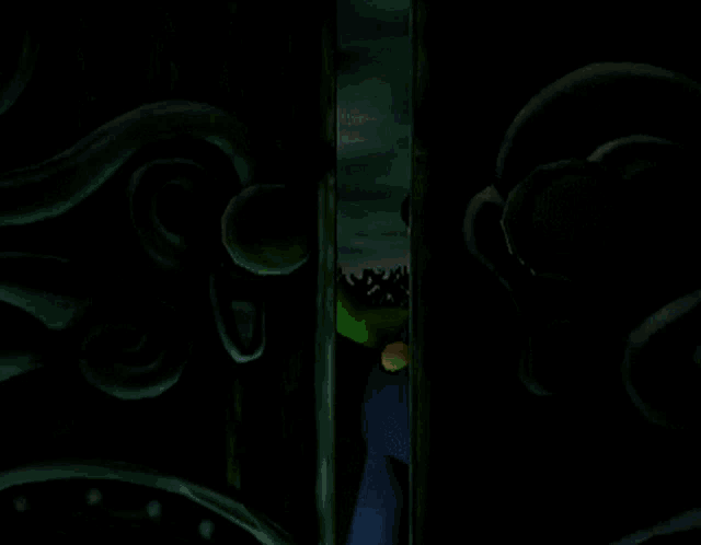 a cartoon character in a green hat with the letter l on it