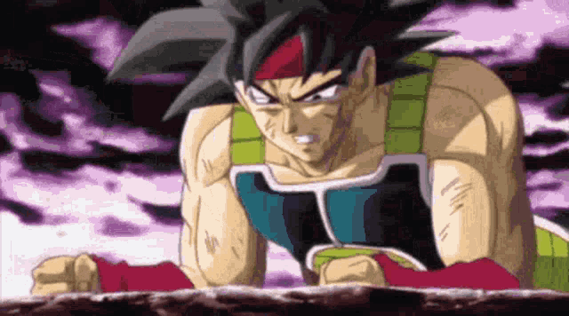 a cartoon character is standing on a rock with his fist in the air and looking at the camera .