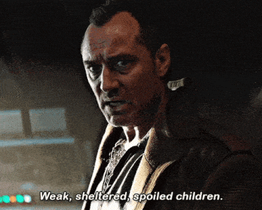 a man in a leather jacket says " weak sheltered spoiled children "