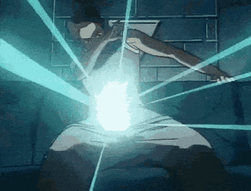 a person is standing in a dark room with a lot of light coming out of their body .