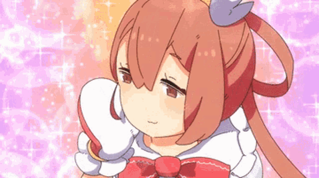 a cartoon girl with long brown hair and a red bow on her head