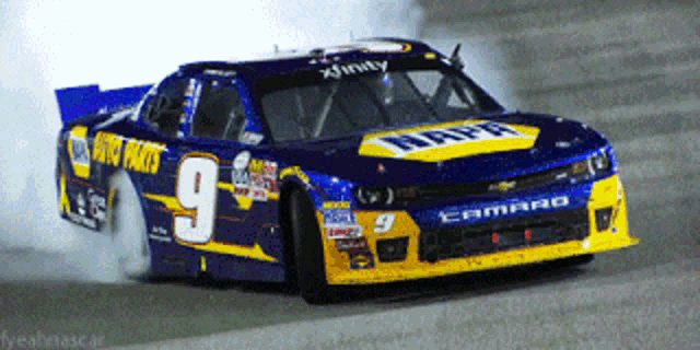 a race car with the number 9 on the side of it