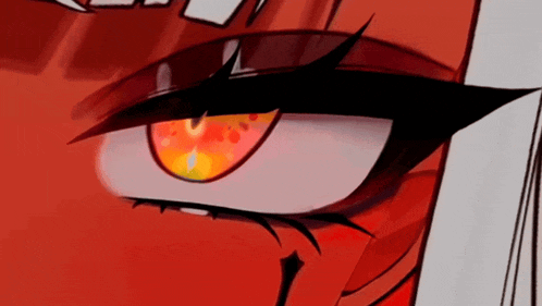 a close up of a cartoon character 's eye with a red pupil