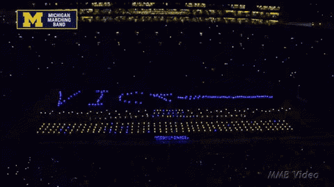 the michigan marching band is playing victory
