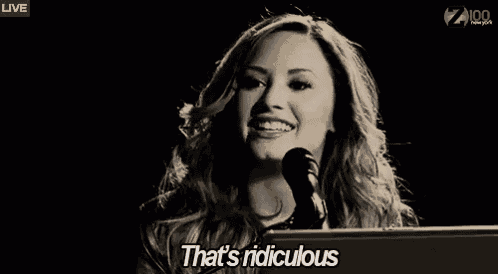a woman is singing into a microphone in a black and white photo and says `` that 's ridiculous '' .
