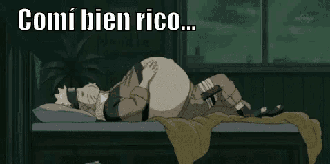 a cartoon character is laying on a bed with a large belly and the words `` comi bien rico '' .