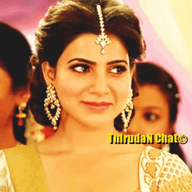 a close up of a woman 's face with a watermark that says ' tirrudan chat ' on it