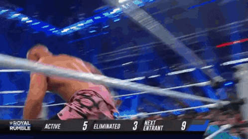 a man is in a wrestling ring with the words active 5 eliminated 3 next entrant 9 on the bottom