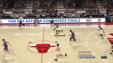 a basketball game is being played between the bulls and the pistons