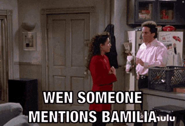 a man and a woman standing in a living room with the caption wen someone mentions bamilia hulu