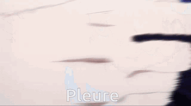 a close up of a person 's fist with the word pleure on the bottom