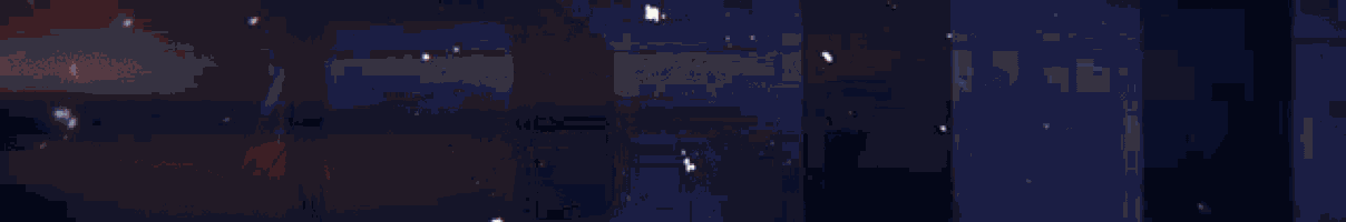 a pixelated image of a sunset with a few buildings in the background